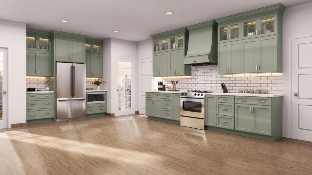 Sage green perimeter cabinetry with stainless appliances